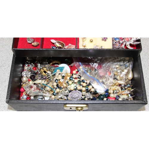 1110 - Black jewellery box with contents, mainly earrings & brooches