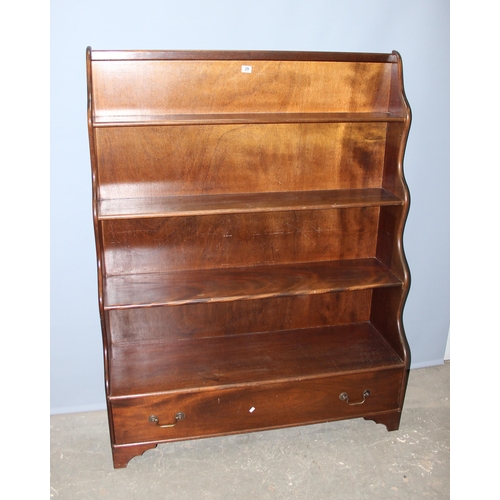 29 - An antique style mahogany waterfall bookcase with 2 drawers, approx 122cm wide