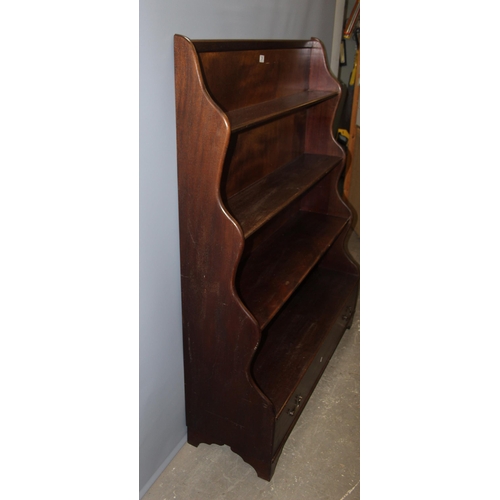 29 - An antique style mahogany waterfall bookcase with 2 drawers, approx 122cm wide