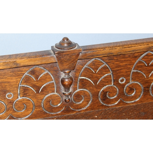 30 - A vintage oak sideboard, 2 drawers over 2 cupboards with carved back, approx 122cm wide