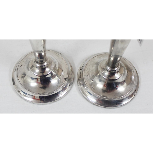 1028 - A pair of silver candlesticks, Birmingham 1972 by AT Cannon Limited, each approx 21cm tall