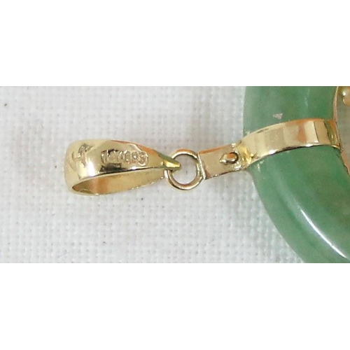 1113 - A Chinese 14ct gold mounted and green jade circular pendant, marked 14k 585 and XRF tested to confir... 