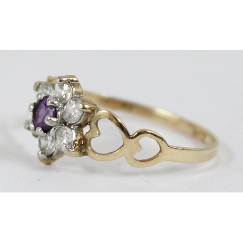 1114 - 9ct gold and floral set ring, approx size P, approx 1.05g gross