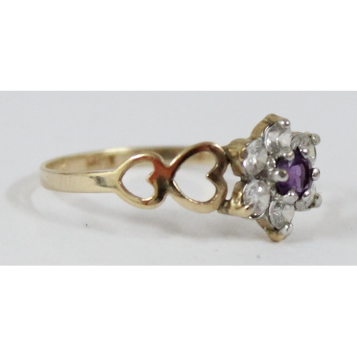 1114 - 9ct gold and floral set ring, approx size P, approx 1.05g gross