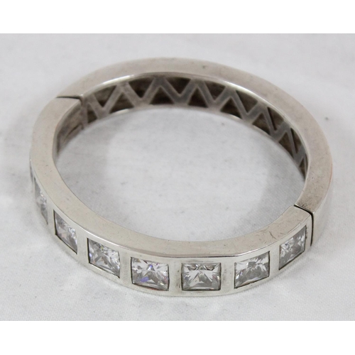 1128 - A 925 silver and white stone cuff bangle, XRF confirmed to be silver, approx 60.07g gross