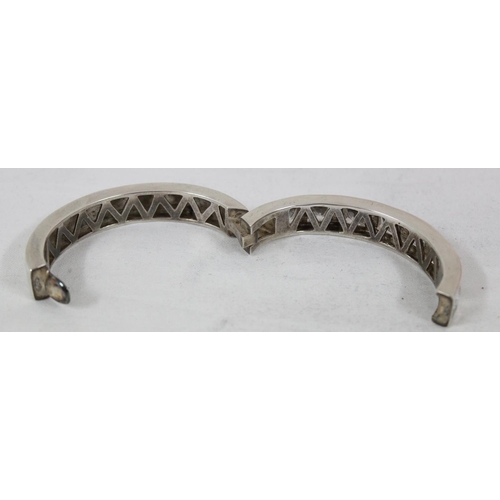 1128 - A 925 silver and white stone cuff bangle, XRF confirmed to be silver, approx 60.07g gross