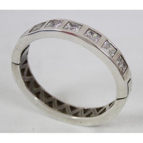 1128 - A 925 silver and white stone cuff bangle, XRF confirmed to be silver, approx 60.07g gross