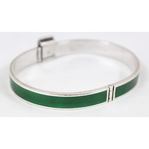 1129 - An unmarked silver and green enamel bracelet marked Gucci, XRF tested as 925 silver, stamped Gucci I... 