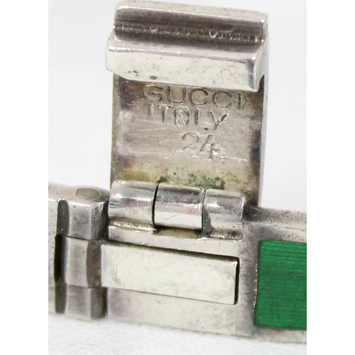 1129 - An unmarked silver and green enamel bracelet marked Gucci, XRF tested as 925 silver, stamped Gucci I... 