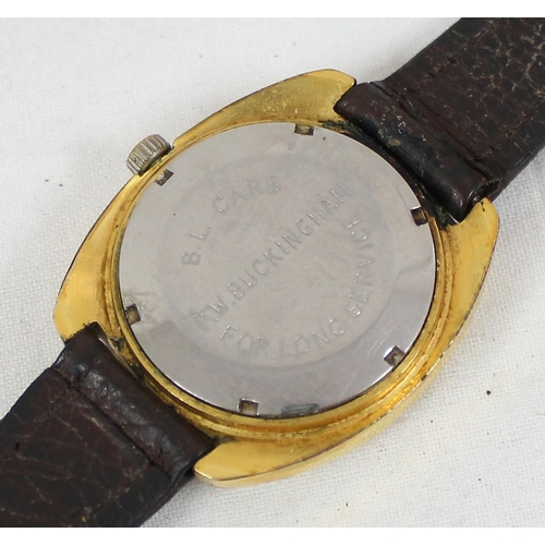 1323 - A vintage gold plated Garrard wrist watch, British Leyland cars long service