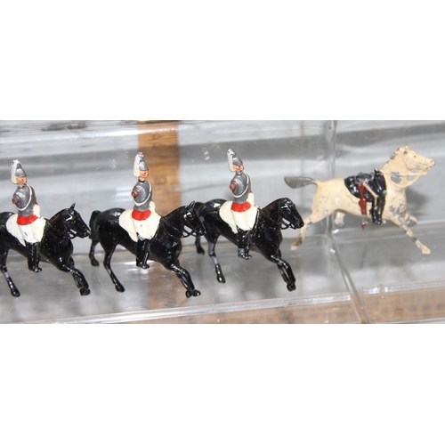 1508 - Qty of painted vintage lead soldiers, mainly Britains, mounted soldiers on horses to inc guards, app... 