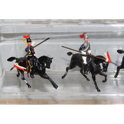 1508 - Qty of painted vintage lead soldiers, mainly Britains, mounted soldiers on horses to inc guards, app... 