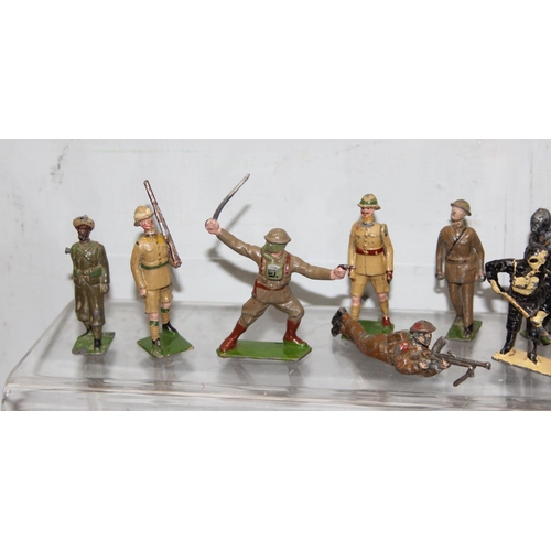 1511 - A large qty of assorted vintage painted lead soldiers, mainly Britains, mainly WW1 period dress