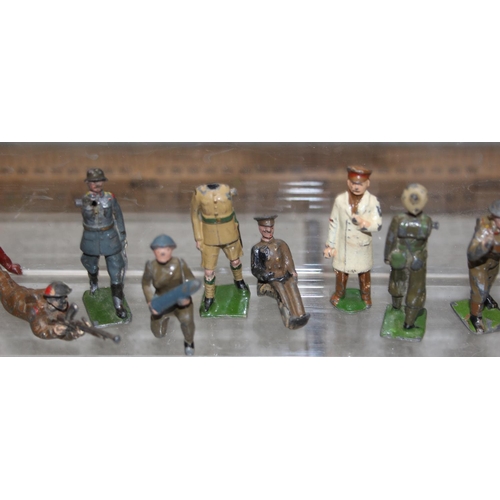 1511 - A large qty of assorted vintage painted lead soldiers, mainly Britains, mainly WW1 period dress