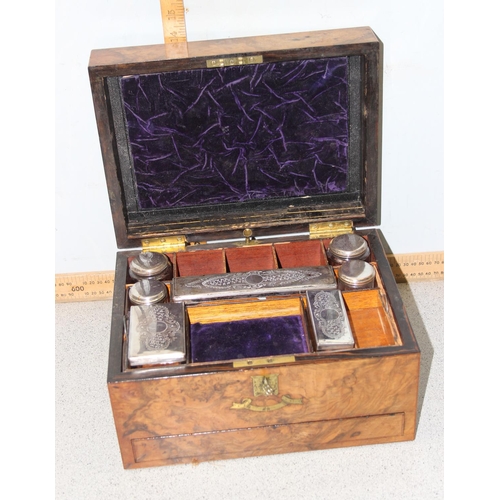 273 - A 19th century burr walnut vanity box with silver plated and cut glass fittings, with original key