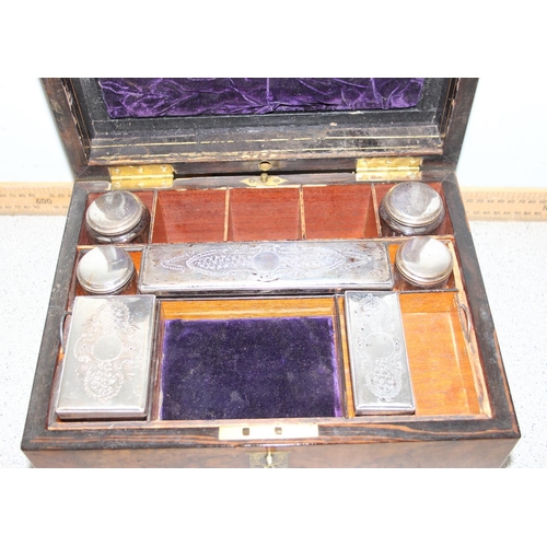 273 - A 19th century burr walnut vanity box with silver plated and cut glass fittings, with original key