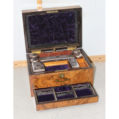 273 - A 19th century burr walnut vanity box with silver plated and cut glass fittings, with original key