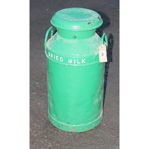 302 - A vintage green painted milk churn, Dried Milk, approx 74cm tall