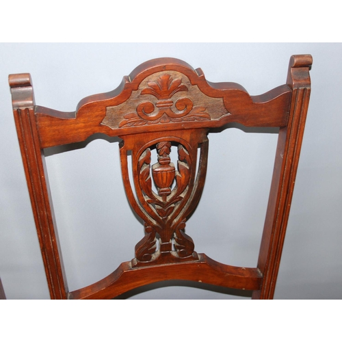 43 - A set of 4 antique chairs with stuffed seats and carved backs