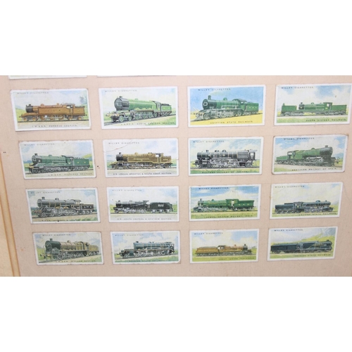 503 - Framed display of Wills train cigarette cards