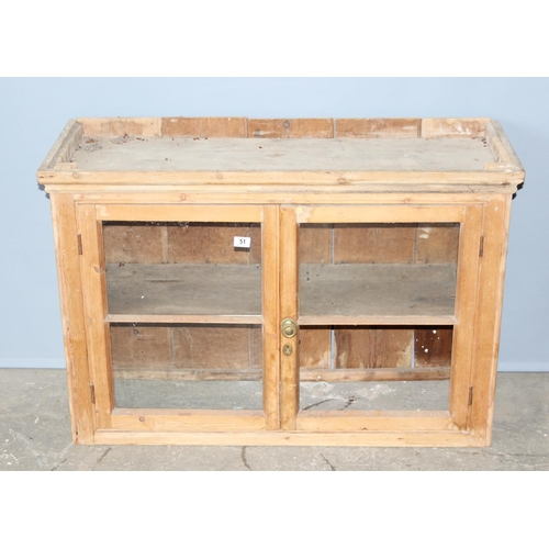 51 - A Victorian glazed pine wall cabinet with shelf, approx 112cm wide