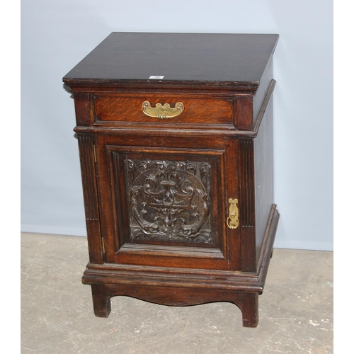 58 - An antique carved oak side cupboard with drawer, approx 55cm wide