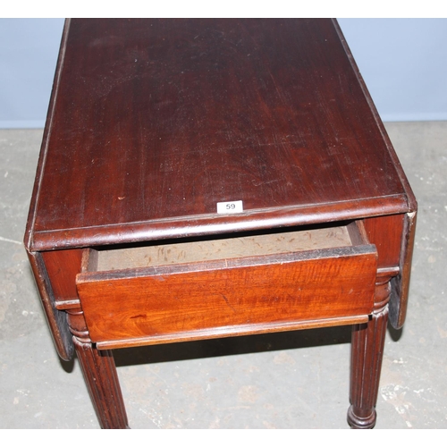 59 - An antique mahogany Pembroke table with reeded legs, single drawer and brass castors, approx 116cm w... 