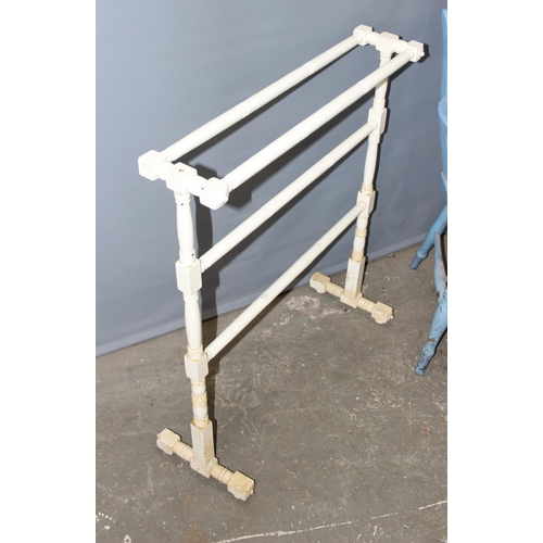 61 - An antique painted towel rail and an antique painted Oxford armchair (2)