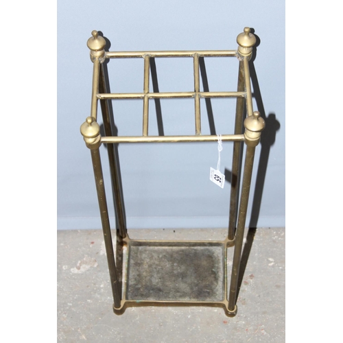 65 - A vintage brass 6 division stick stand, approx 24cm wide