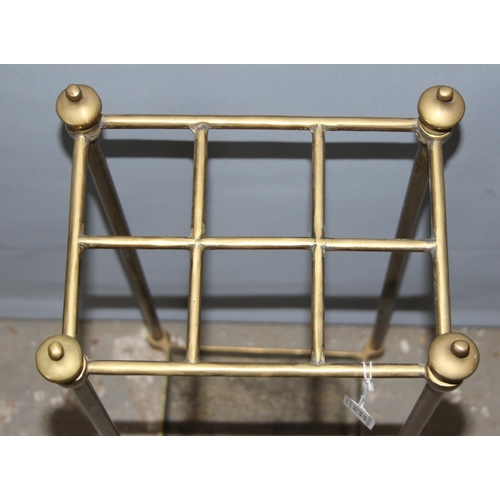 65 - A vintage brass 6 division stick stand, approx 24cm wide