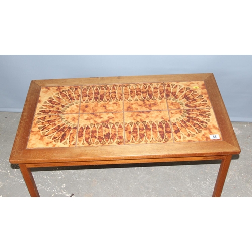 68 - A retro Danish tile topped coffee table, approx 93cm x 53cm