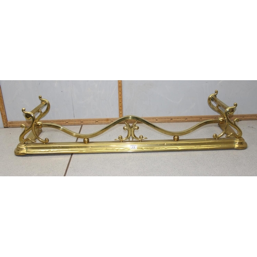 71 - A large Art Nouveau brass fire fender, appro 127cm wide