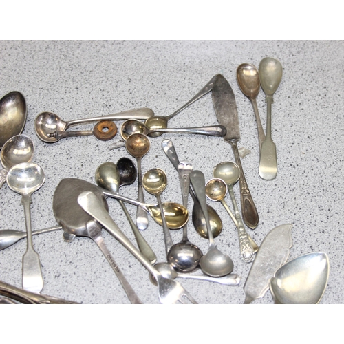 1034 - Qty of assorted cutlery, mostly silver plated, some silver handled and silver mounted items