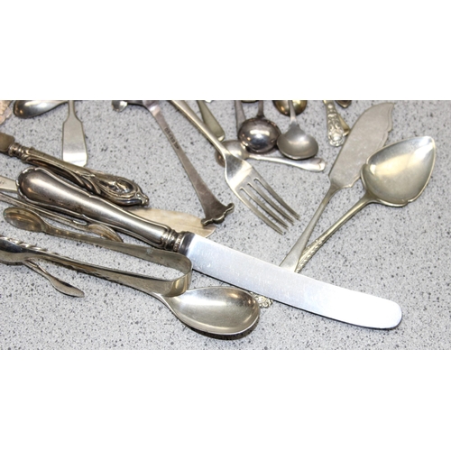 1034 - Qty of assorted cutlery, mostly silver plated, some silver handled and silver mounted items