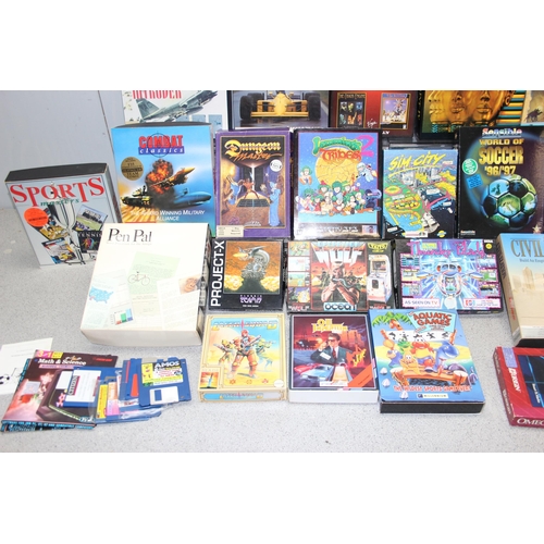 1537 - A large qty of assorted vintage computer or video games, mainly Amiga