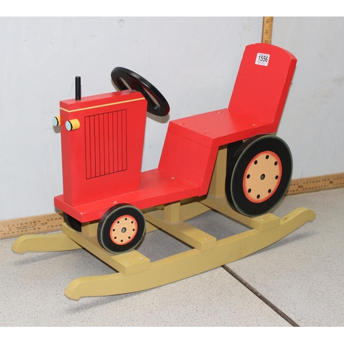 1556 - Childs wooden sit on rocking tractor