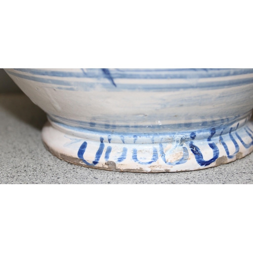 1623 - An unusual Delft or Faience pottery jug with 2 handles and a spout, possibly a posset pot or an apot... 