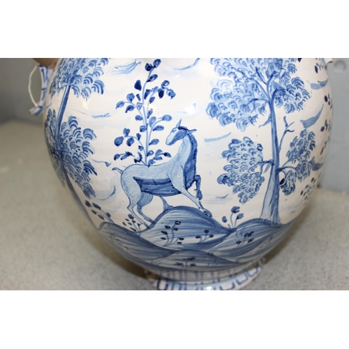 1623 - An unusual Delft or Faience pottery jug with 2 handles and a spout, possibly a posset pot or an apot... 