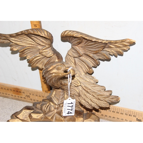 1774 - An antique carved giltwood frieze of an eagle, possibly from a mirror frame, approx 35cm wingspan