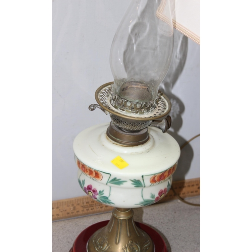 241 - An antique oil lamp with painted glass reservoir and a modern glass table lamp (2)