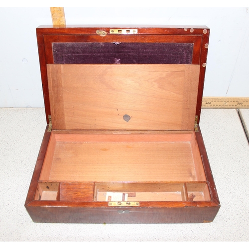 280 - An antique mahogany writing slope with brass inlay