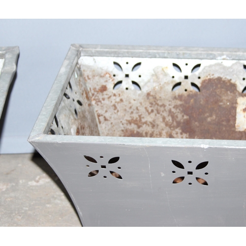 303 - A pair of aluminium garden planters