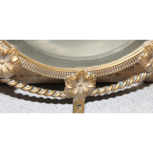 403 - Oval bevelled wall mirror with gilt wirework frame