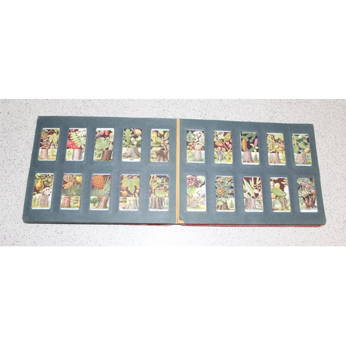 524 - Antique Wills cigarette card album approx 200 cards, some with military themes