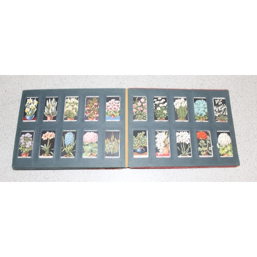 524 - Antique Wills cigarette card album approx 200 cards, some with military themes