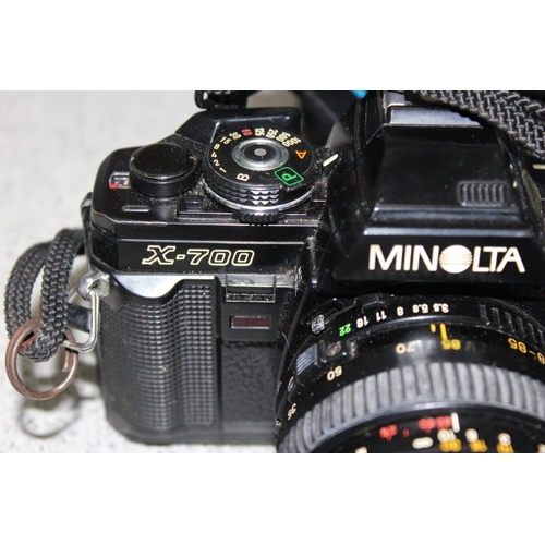 656 - Minolta X-700 camera with 2 lenses, accessories and carry case