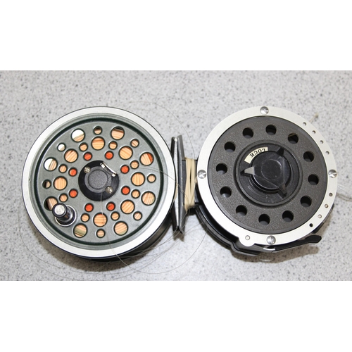 725 - Shakespeare beaulite fly fishing reel and a Mitchell 710 automatic fly fishing reel