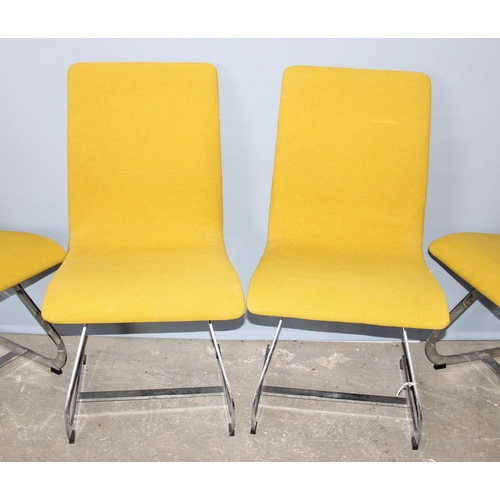 84 - Retro 1970's cantilever dining chairs in the style of Milo Baughman with brushed steel frames and mu... 