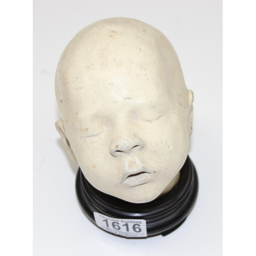 1616 - Plaster cast of a baby's head, possibly a death mask