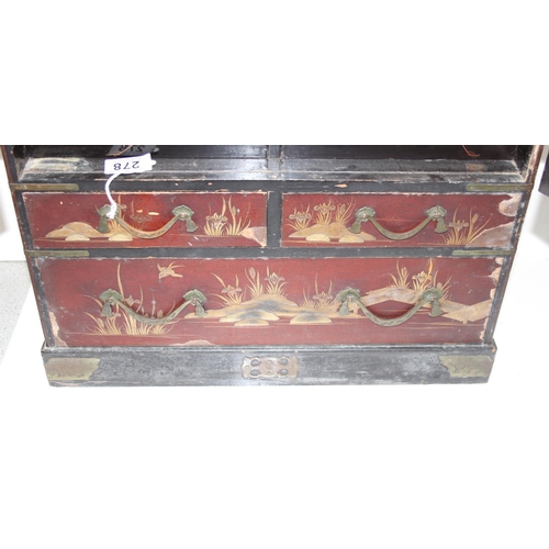 278 - An early 20th century Japanese lacquered table top cabinet, 2 short over one long drawer below 2 cab... 